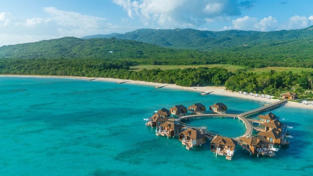 Over water bungalows at Sandals South Coast Jamaica couples resort