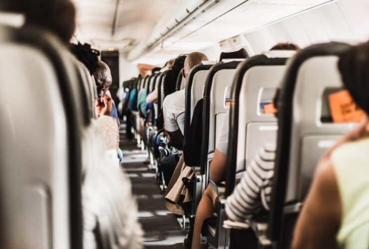 Airplane Seats (Photo by Gerrie van der Walt on Unsplash)