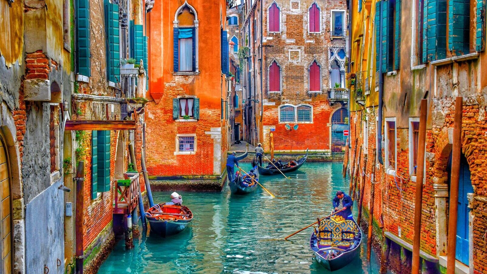 Venice canals (Photo by Tom Podmore on Unsplash)