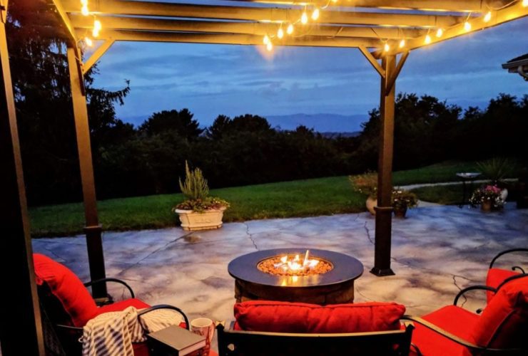 Vacation home patio with fire pit (Photo: @MargJohnsonVA via Twenty20)