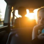 Little girl in the back seat of a car (Photo: @tuikanov via Twenty20)