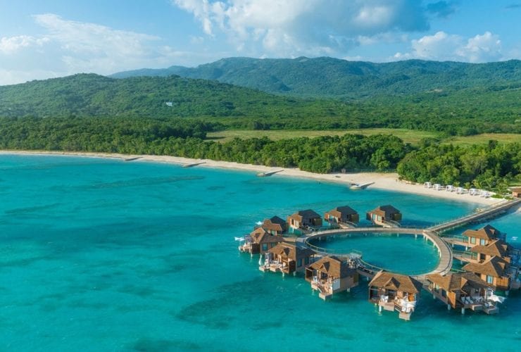 Over water bungalows at Sandals South Coast Jamaica couples resort