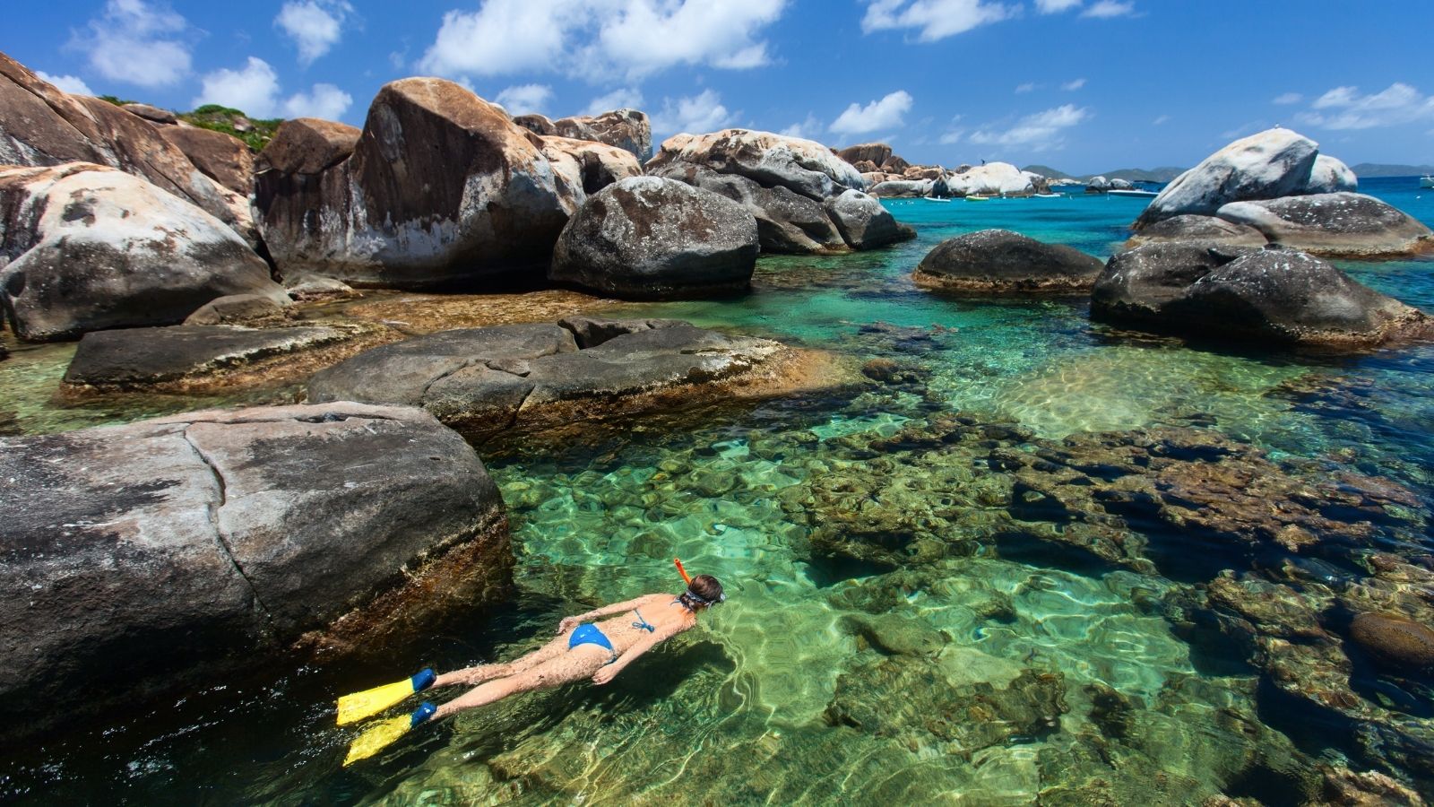 Woman snorkeling at The Baths on Virgin Gorda, BVI (Photo: BlueOrange Studio via Shutterstock)