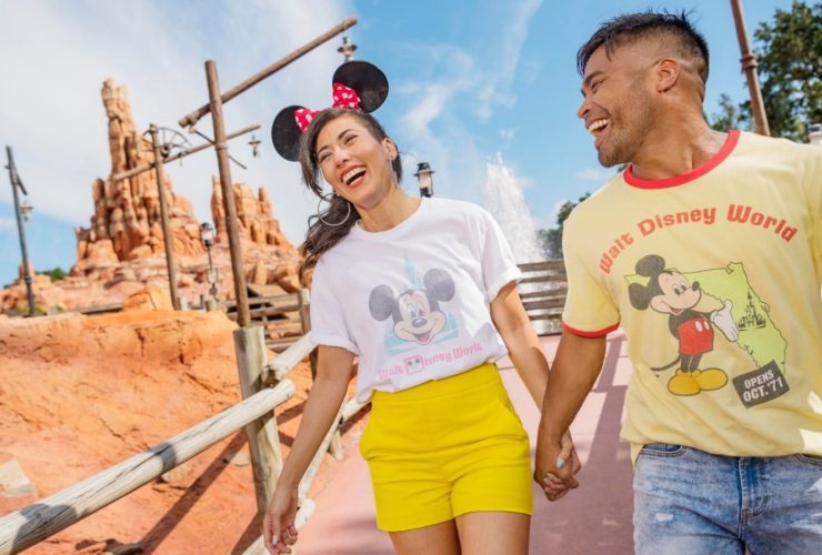 Couple holding hands at Walt Disney World (Photo: Walt Disney World)