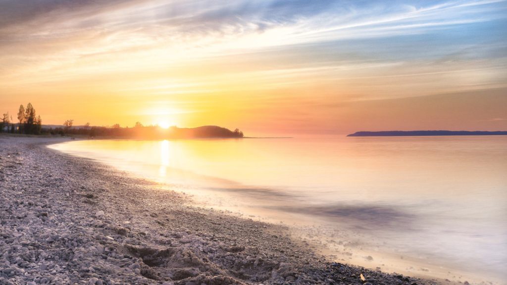 sunset at sleeping bear dunes, a popular midwest vacation destination