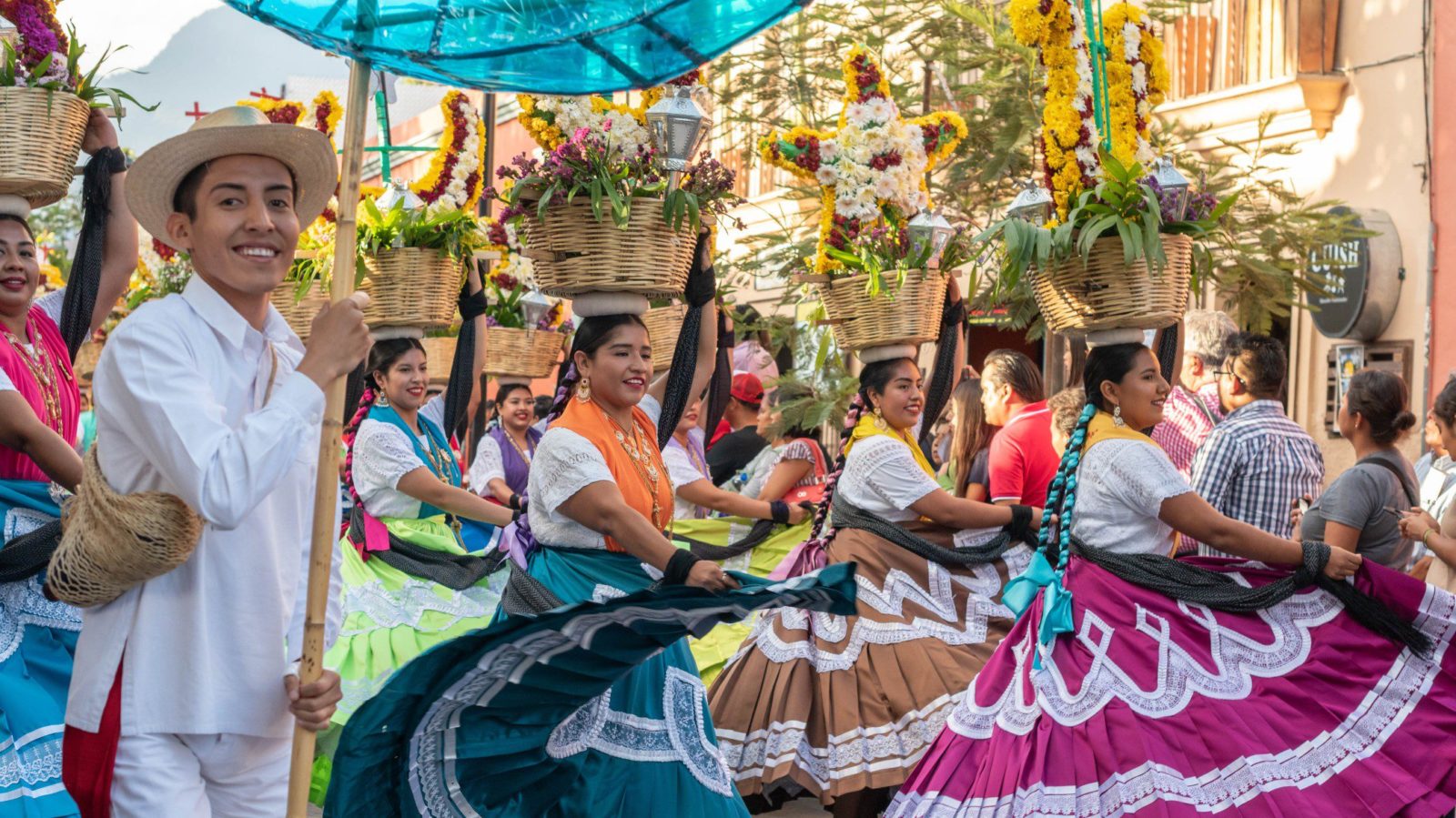 People dressed in traditional clothes for a celebration in Oaxaca, Mexico