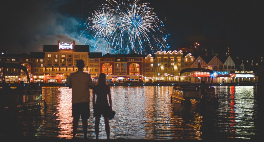 Pier at night with fireworks