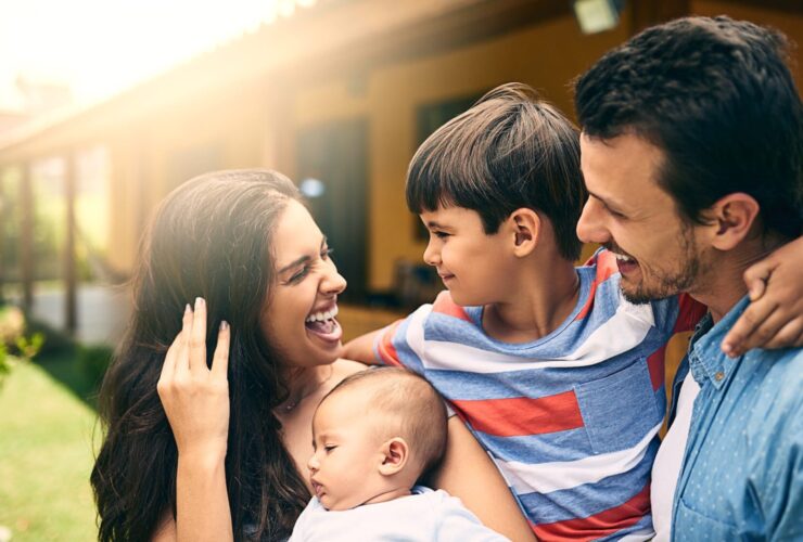 Family with toddler and baby on vacation