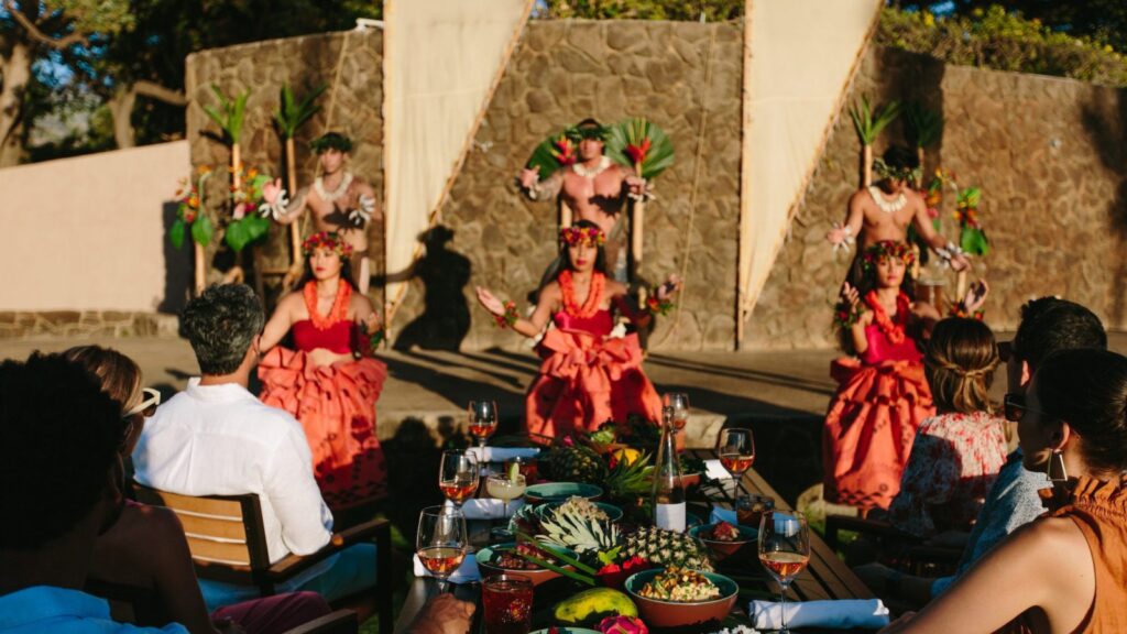 Luau performers and audience members during the Grand Wilea luau