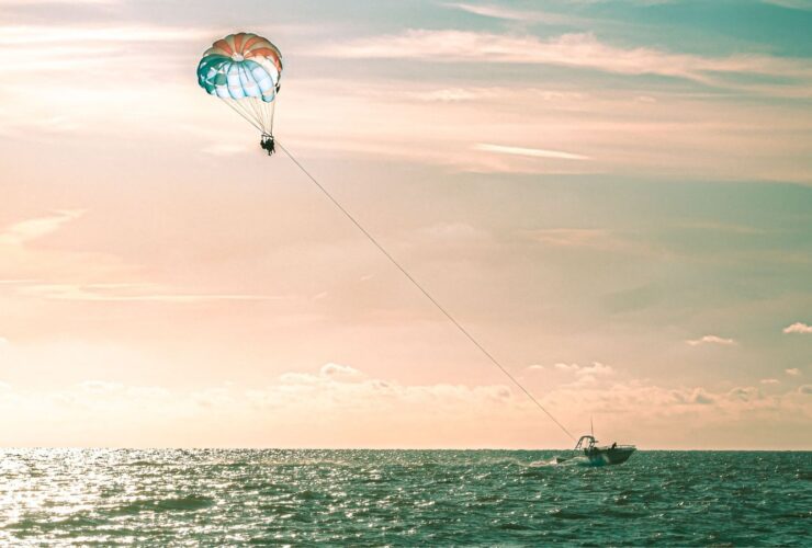 Parasailing at sunset above Clearwater Beach, Florida (Photo: Envato)