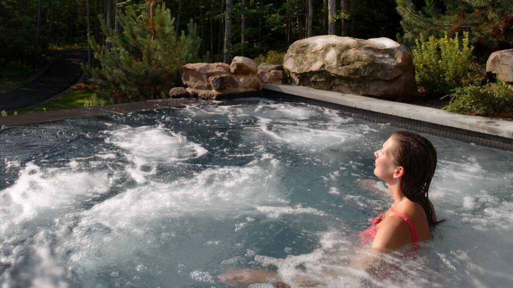 Woman in natural infinity pool