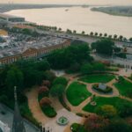 view of French Quarter and river in New Orleans with St. Louis Cathedral and Jackson Square in foreground