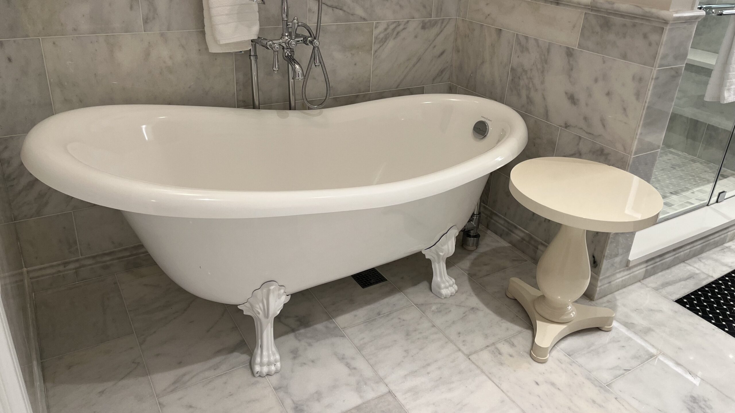 My bathroom had beautiful marble settings, with a glass shower and a claw foot tub (Photo: Megan duBois)