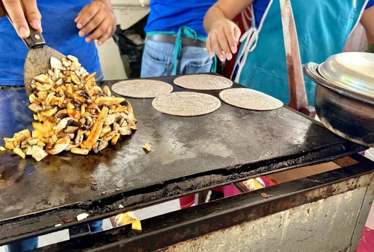 tacos being cooked at a taco stand in Puerto Vallarta on a food tour