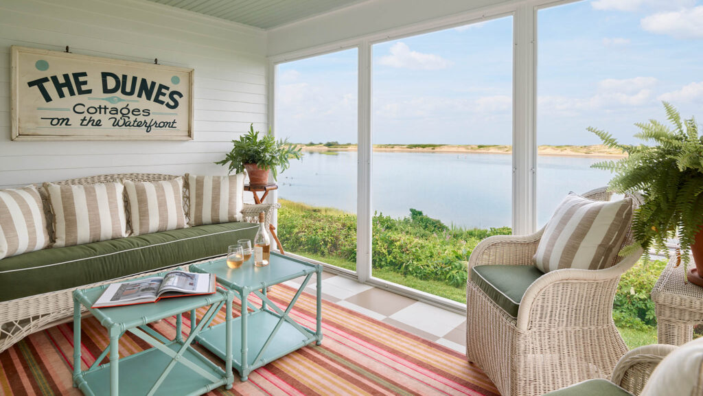 A screened porch overlooking the water in Maine at The Dunes on the Waterfront